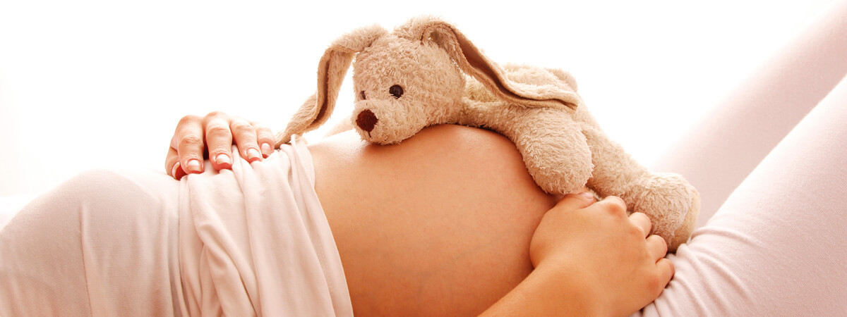 Pregnancy massage with safe side-lying positioning at our Canberra clinic