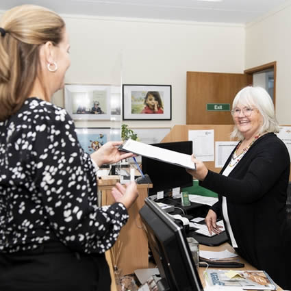 The welcoming Weston Creek Chiropractic Centre front desk and team