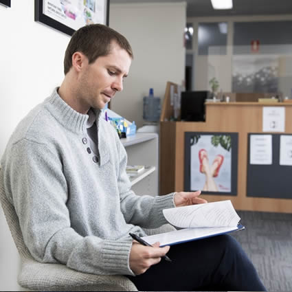 A new patient booking directly with a Canberra chiropractor, no referral needed